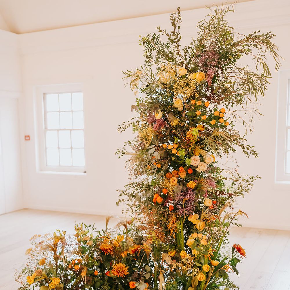 Orange and burnt orange large flower display 