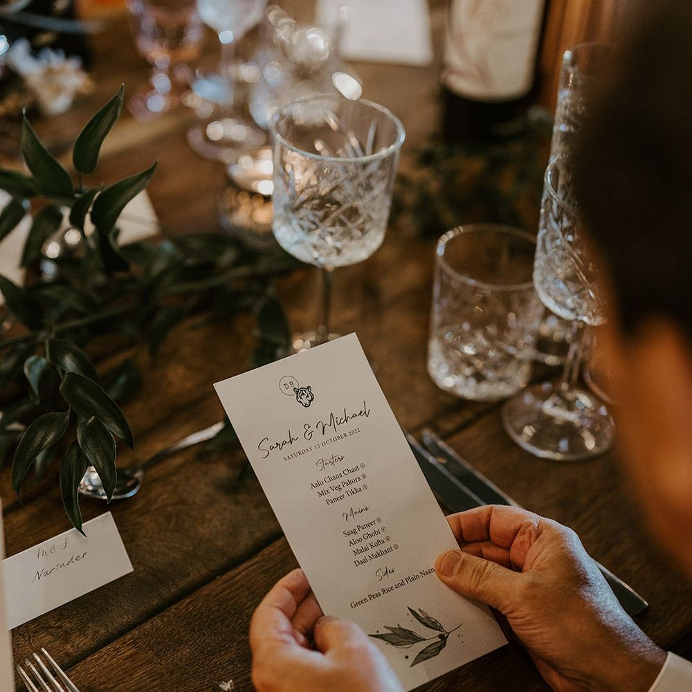 Black and white wedding menu for multicultural wedding 