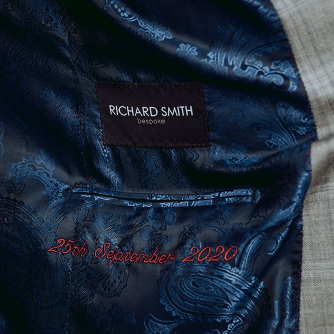 Grooms wedding suit personalised with the wedding date 