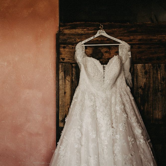 Tuscany bride's dress hanging up