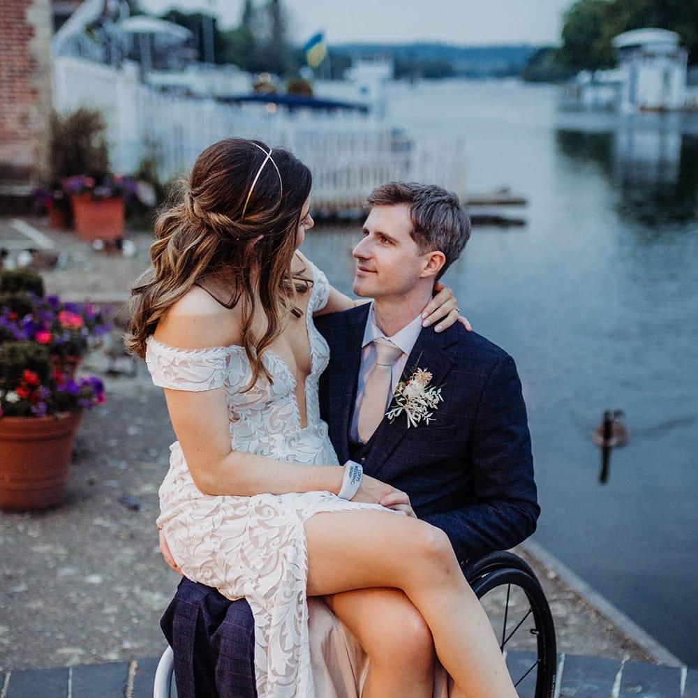 Bride and groom look lovingly into each other's eyes 
