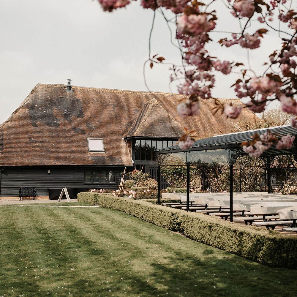 The Old Kent Barn wedding venue outdoor ceremony grounds 