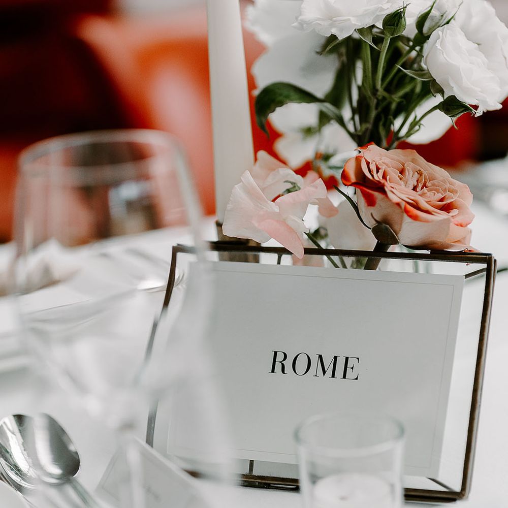 Minimalist table name sign named after places in Italy 