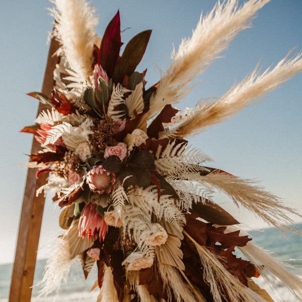 Pampas grass decor for triangle beach alter construction