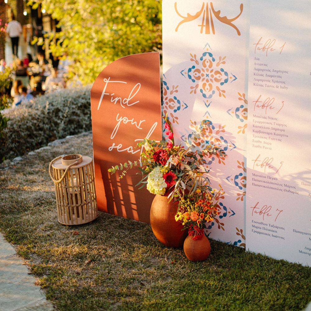 A modern table seating plan with terracotta colour palette and tile detailing