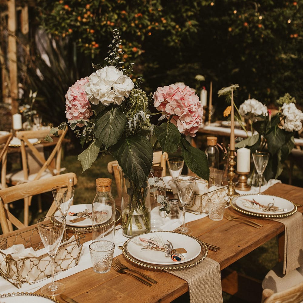 Rustic table setting complete with florals throughout
