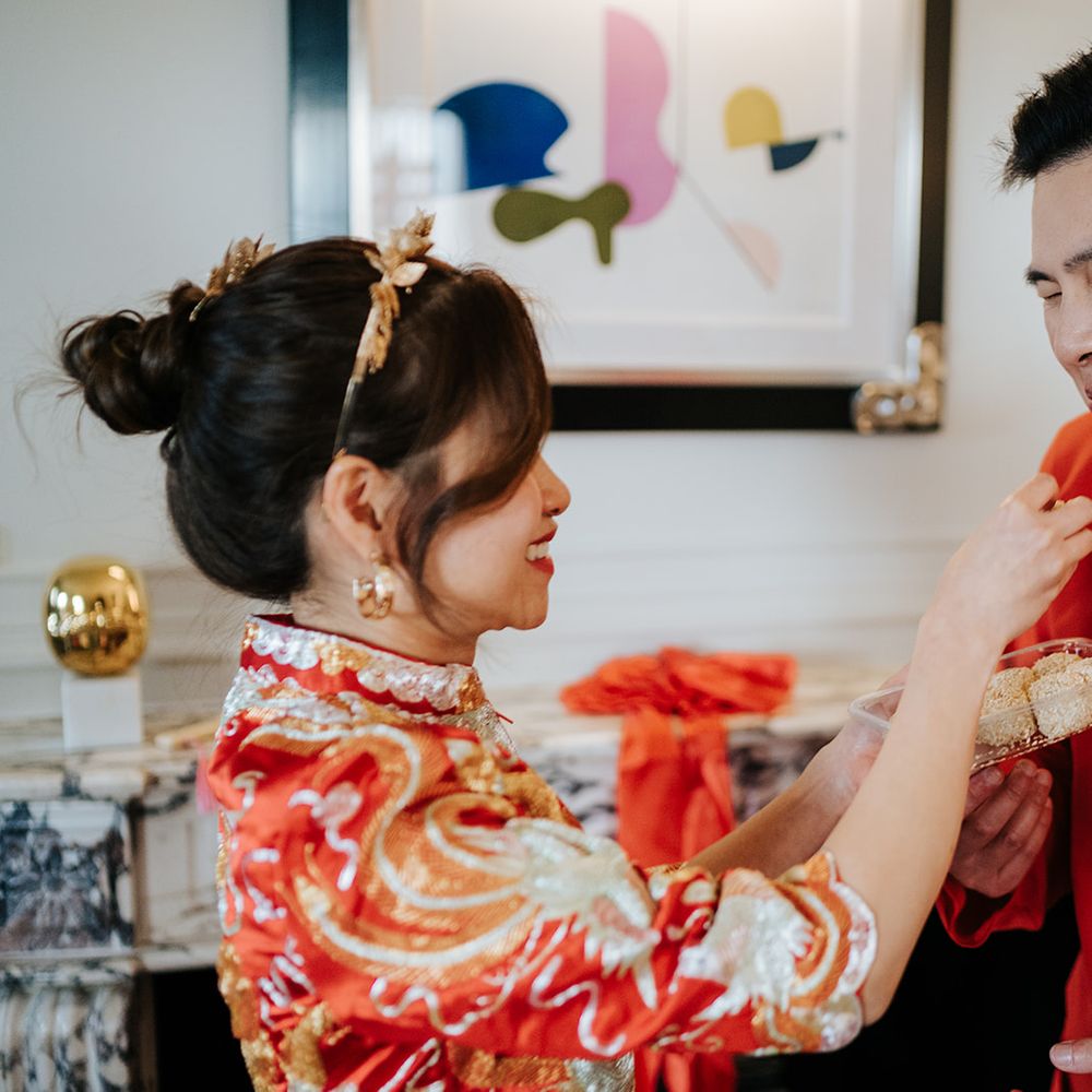 Bride & groom during Chinese tea ceremony at The Dorchester with friends & family