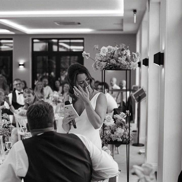 Bride wipes her tears as she reads out her bridal wedding speech 