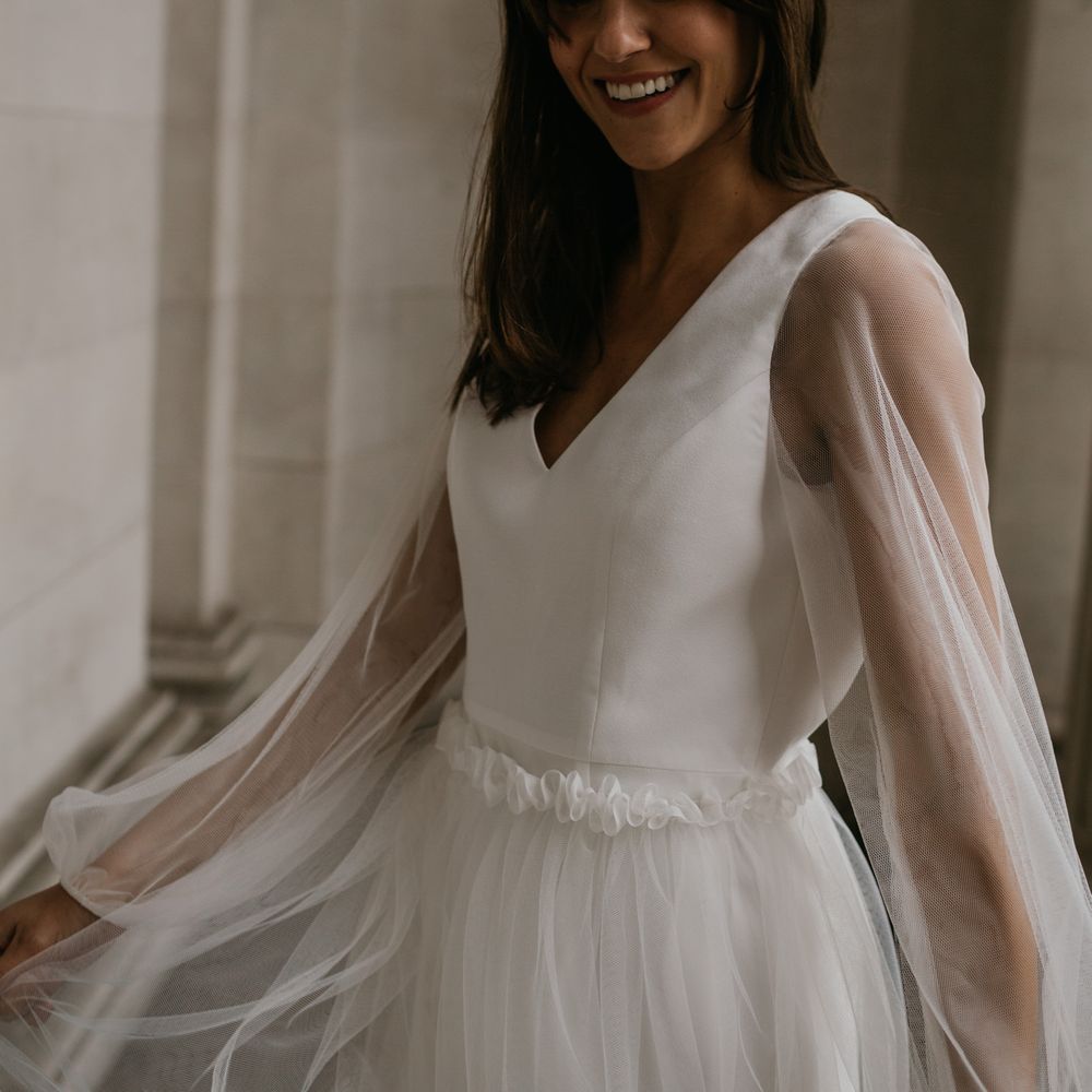 Sheer long sleeves and ruffled waist detail by Story Of My Dress 