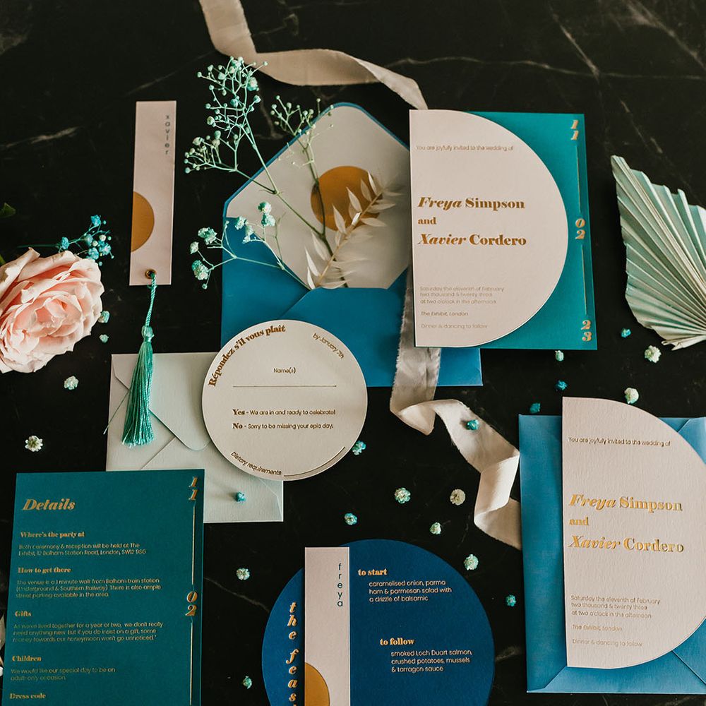 teal wedding stationery suite with gold foil font 