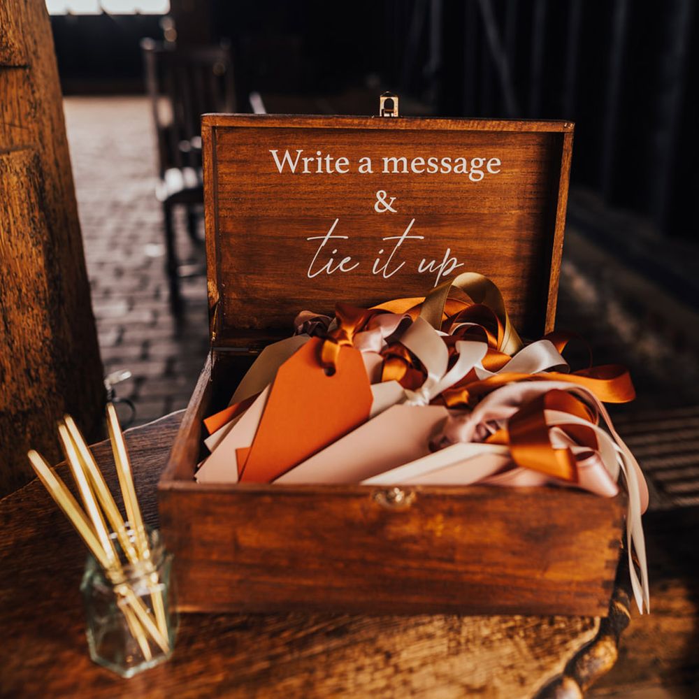 Wedding favours in wooden box with silk ribbons 