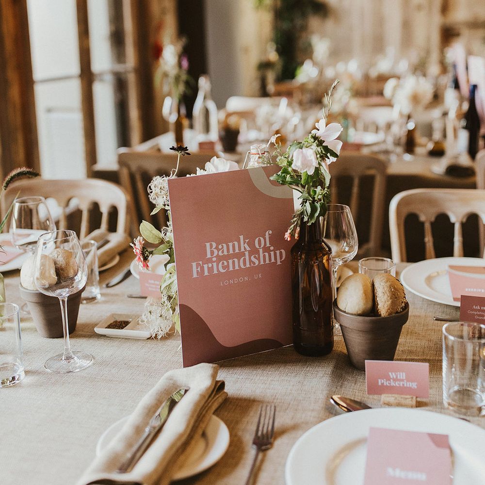 Rustic tablescape complete with pink stationery 