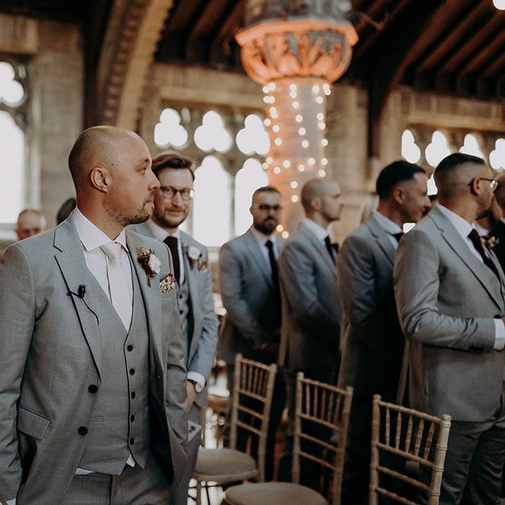 Groom watches as his bride walks down the aisle on their wedding day | Irene Yap Photography