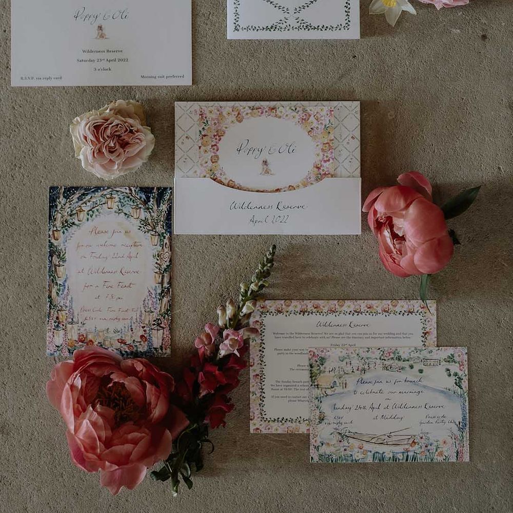 Flower watercolour wedding stationery with pink flowers 