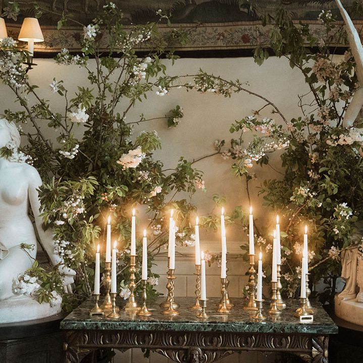 Cosy warm twinkling candlelight with angel cherub statues at Elmore Court 