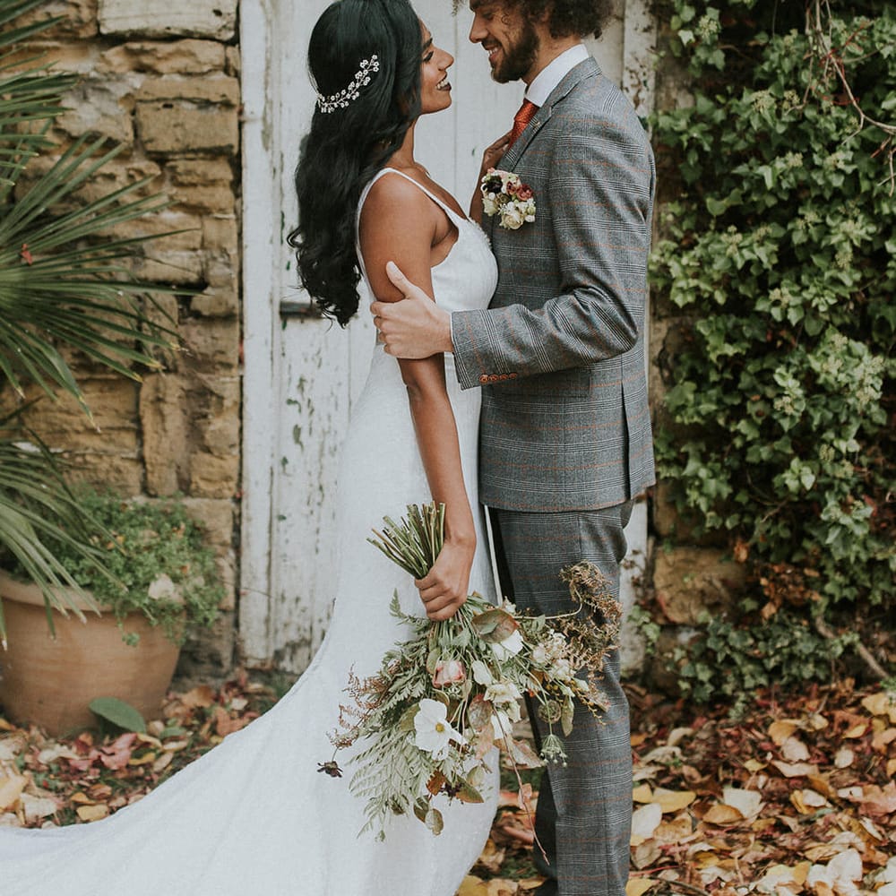 Bride and groom portrait at Hooton Pagnell Hall in Autumn 