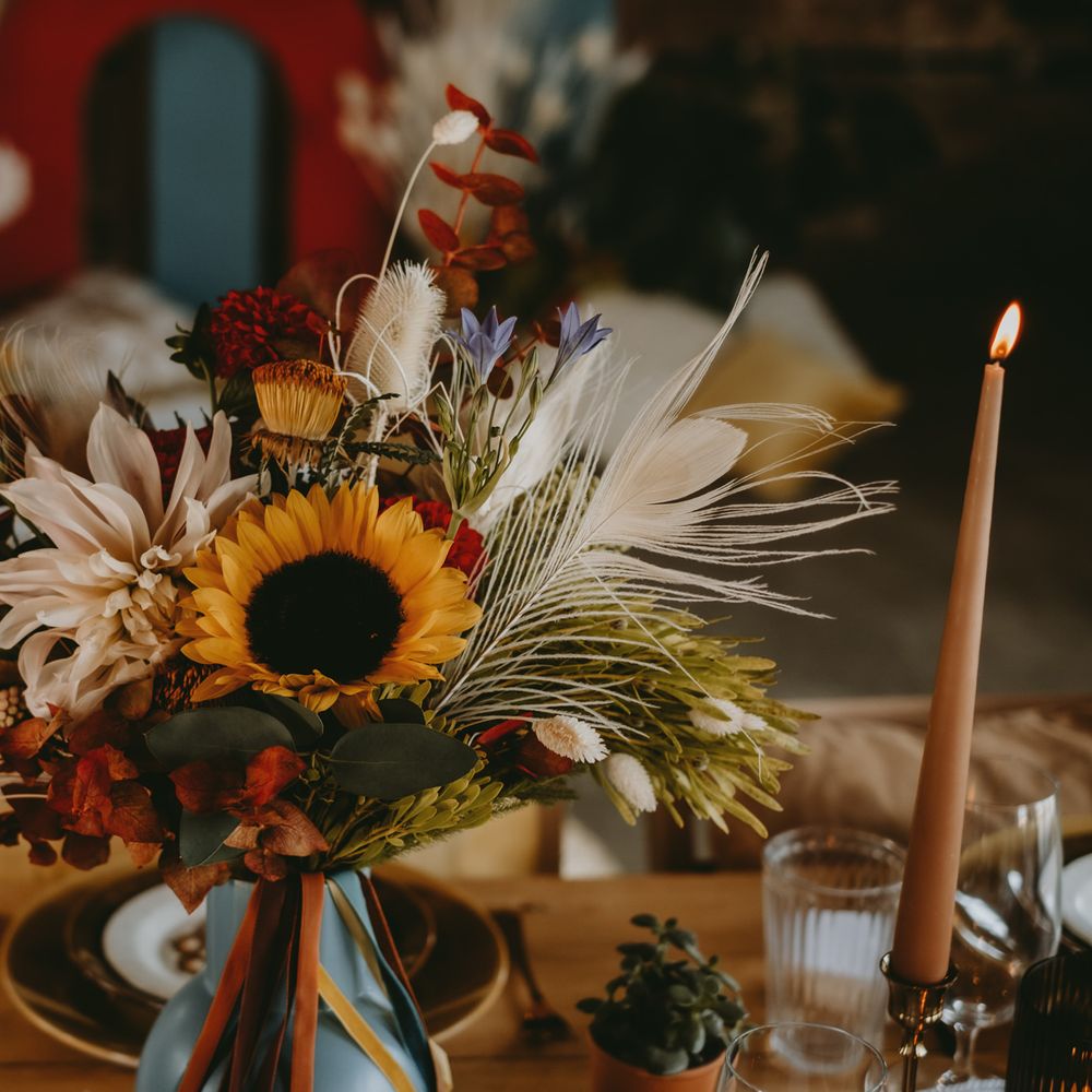 wildflower centrepiece with dahlias and sunflowers