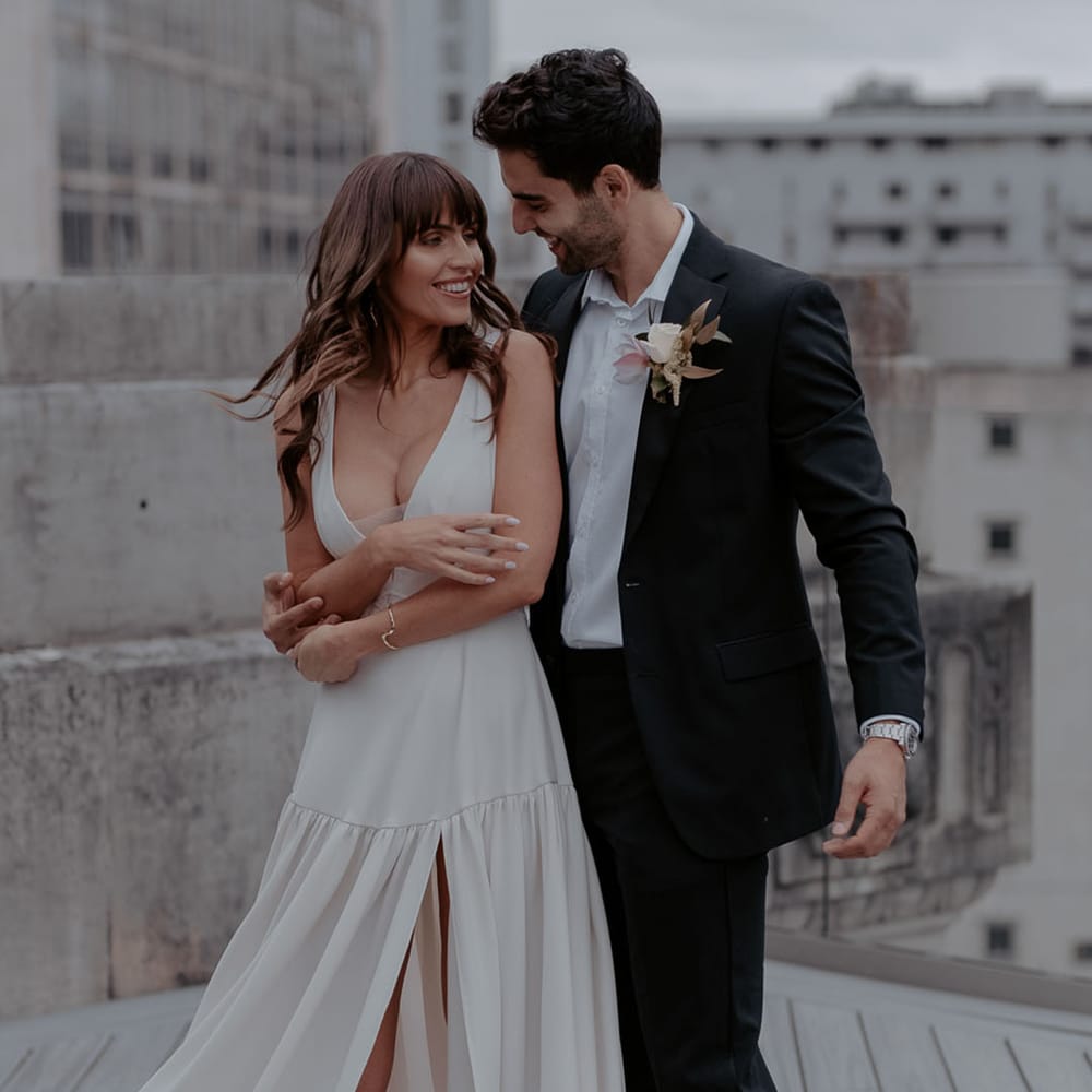 Modern Manchester Hall wedding with bride in a floaty wedding dress with front slit 