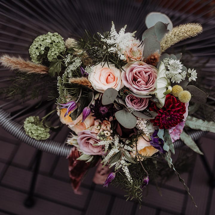 Pink, purple and red wedding flower bouquet 