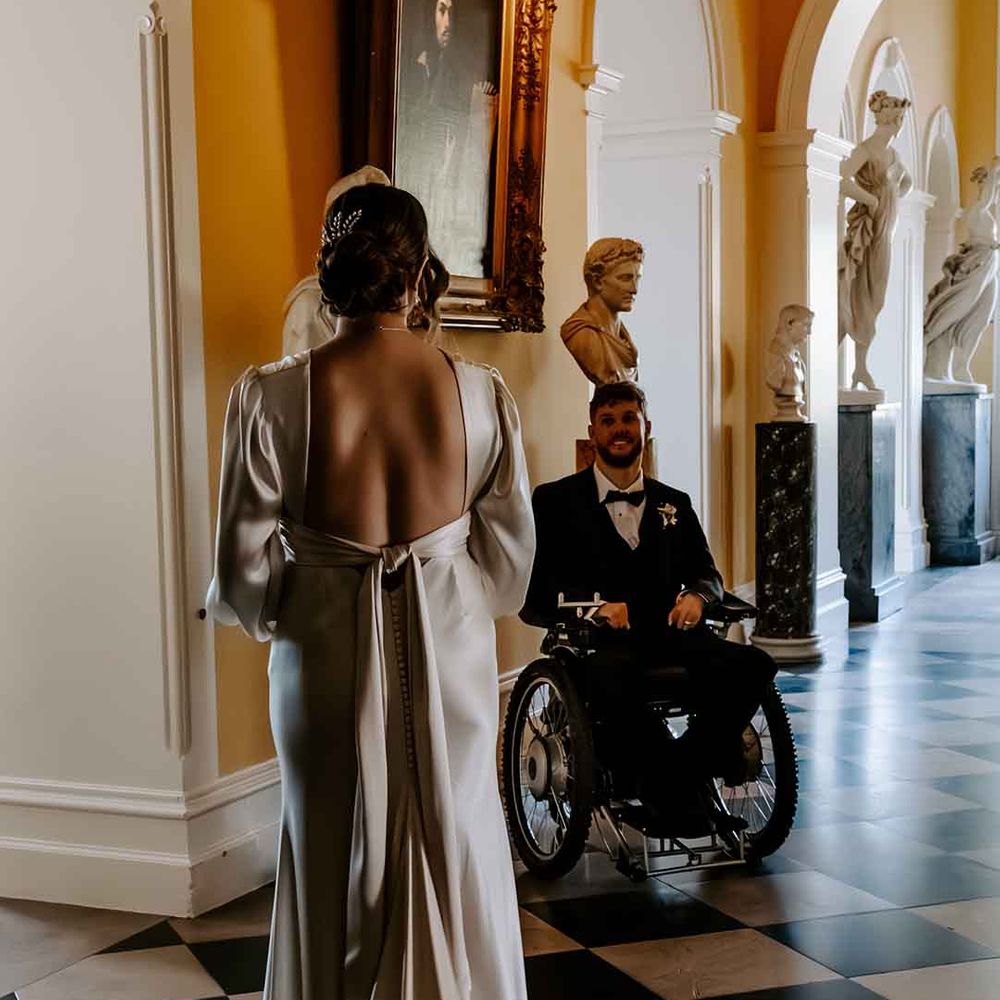 backless satin wedding dress at Capesthorne Hall wedding