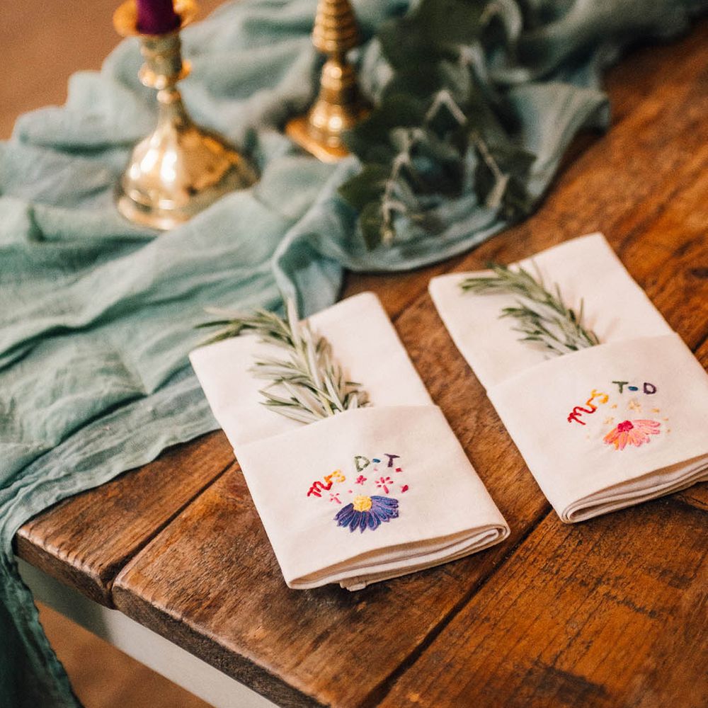 Rainbow embroidered wedding napkins and favours for the wedding breakfast 