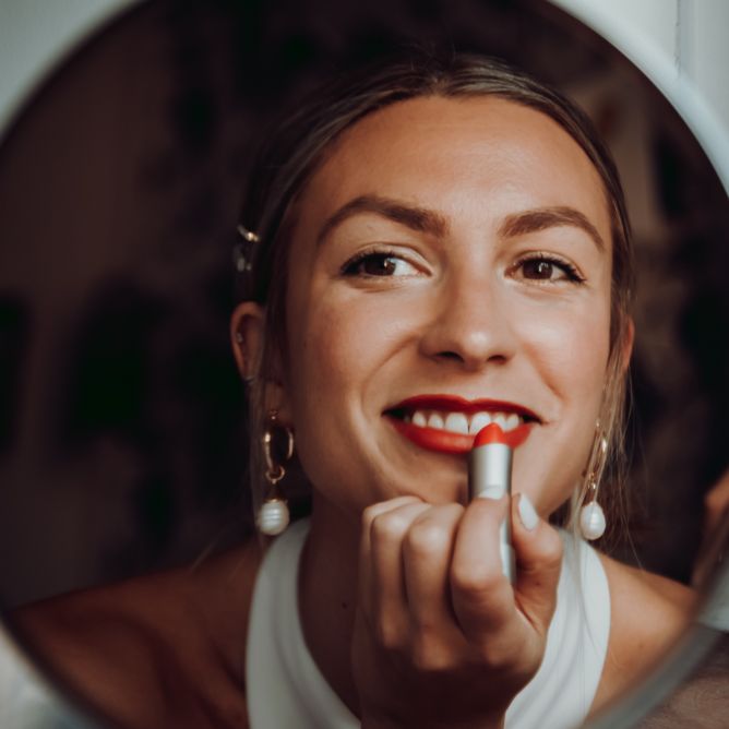 bride wearing bright red lipstick 