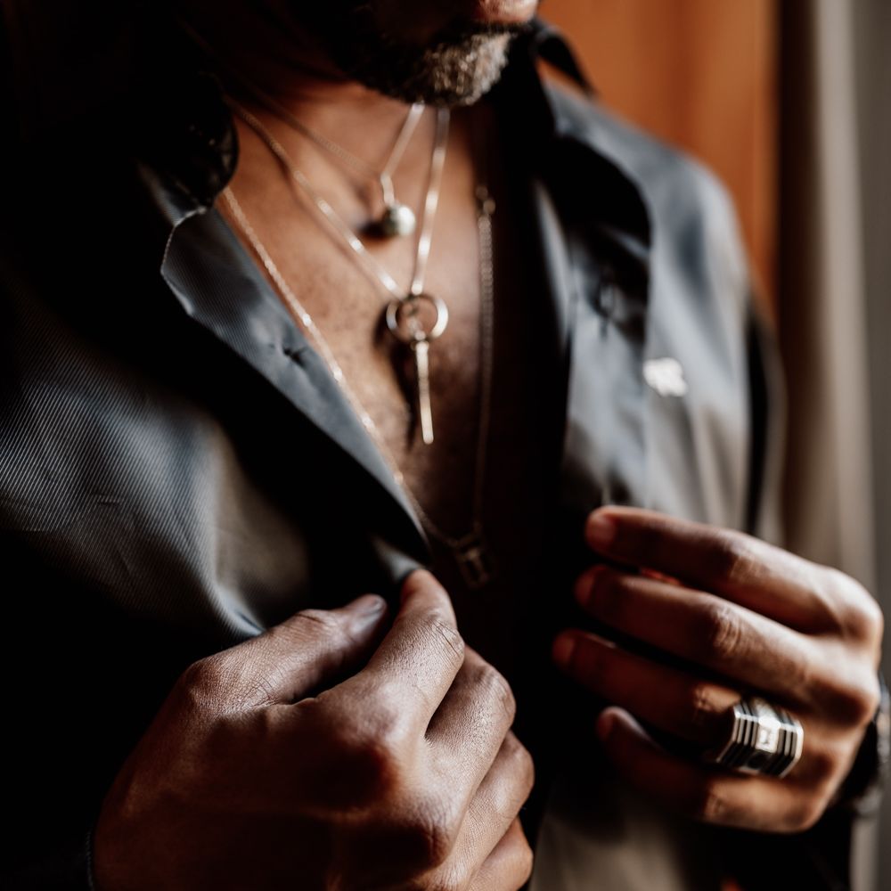 Groom buttons up black shirt 