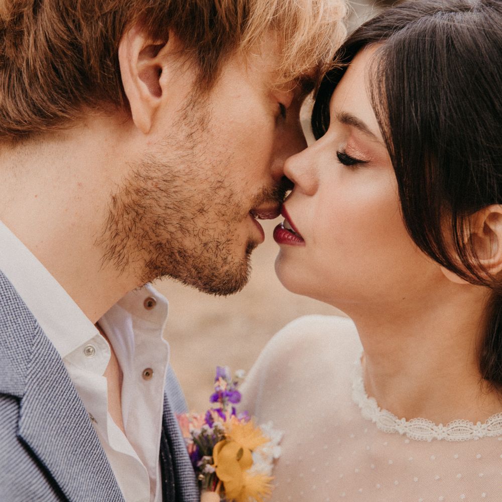 Bride & groom kiss during Spanish elopement
