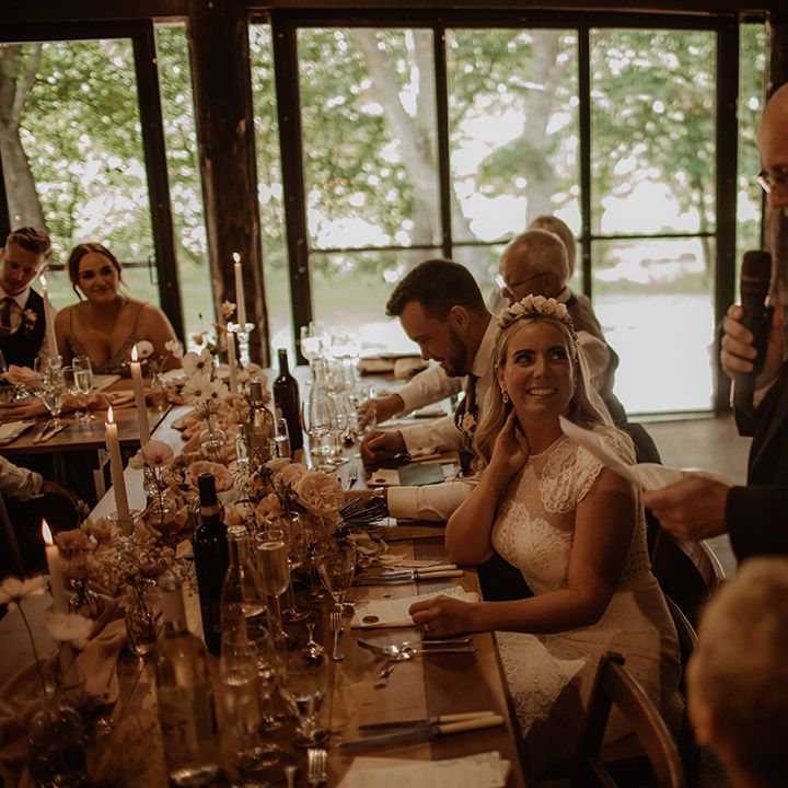 Father of the bride wedding speech at Summer Dewsall Court wedding with floral arch 