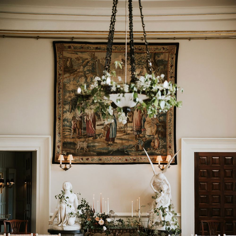 Romantic flowers and taper candle wedding ceremony decor 