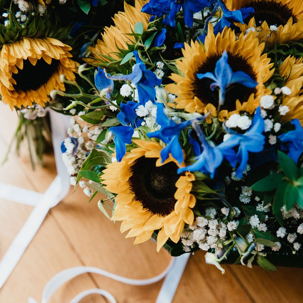 Sunflower and gypsophila with purple flower wedding bouquet