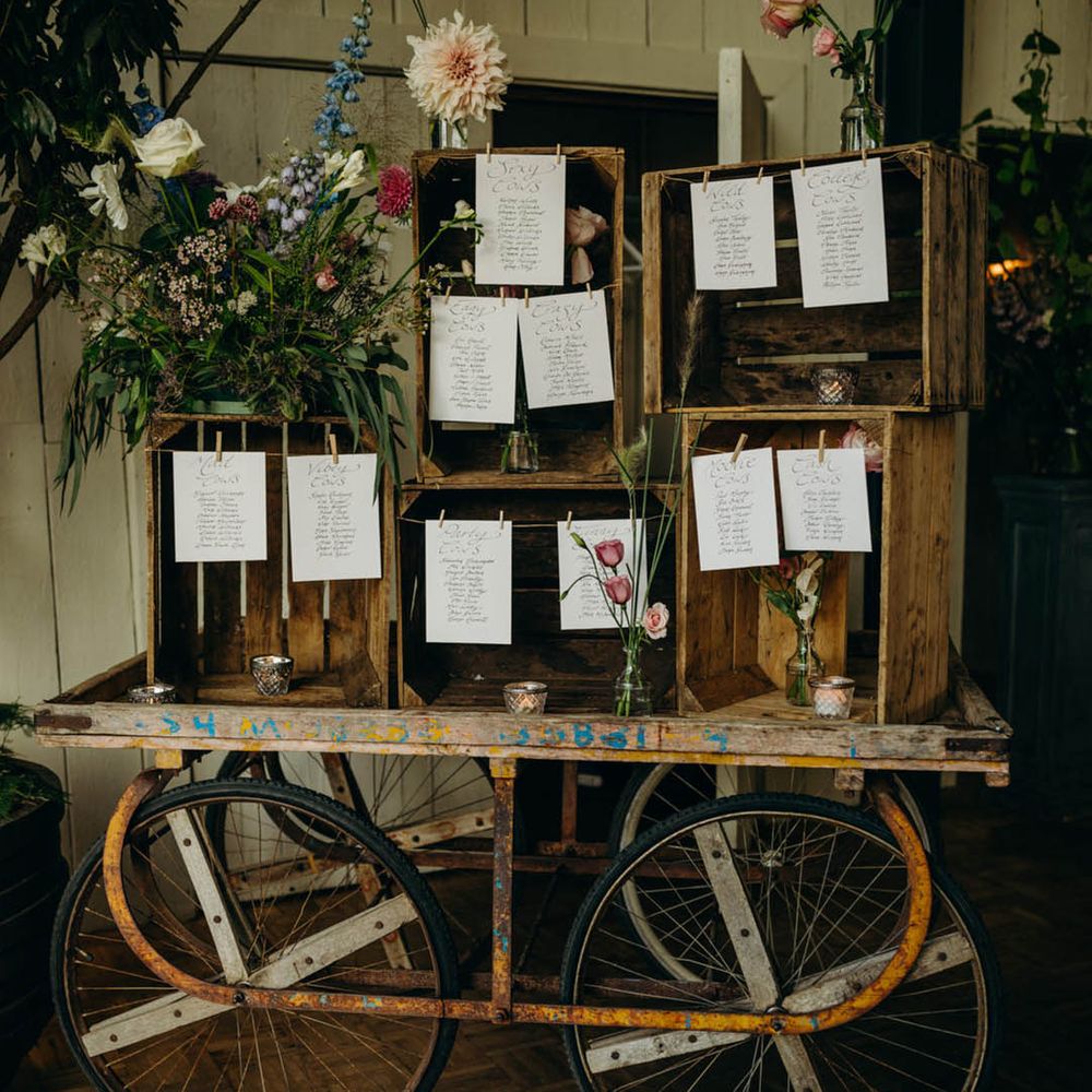 Rustic wedding table plan made from wooden crates 