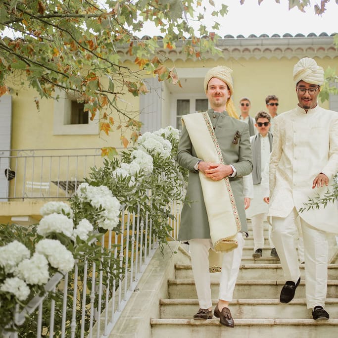 Groom in a cream and green Sherwani and Churidar outfit at Domaine de Blanche Fleur, Provence Hindu wedding 