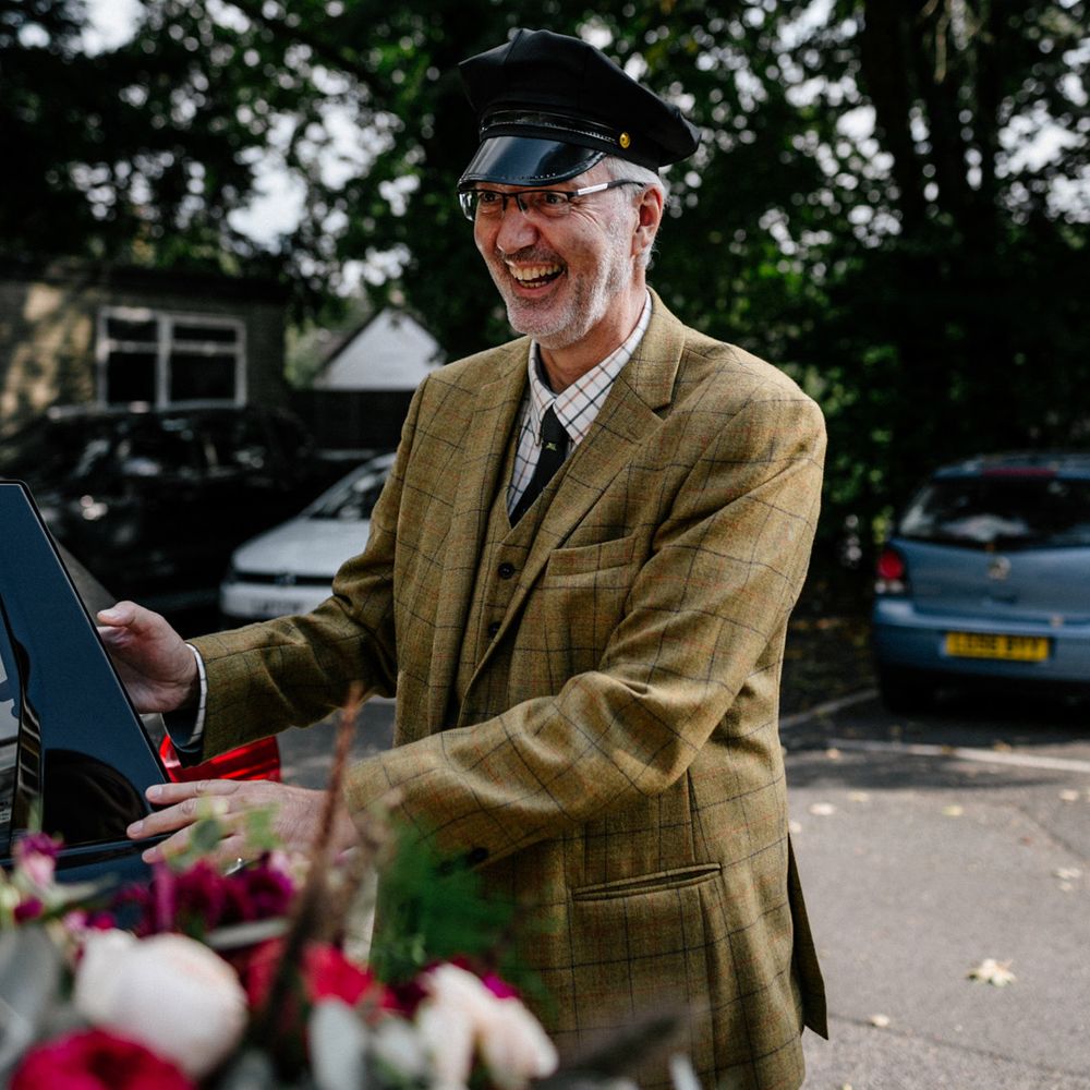 Chauffer in tweed suit and hat
