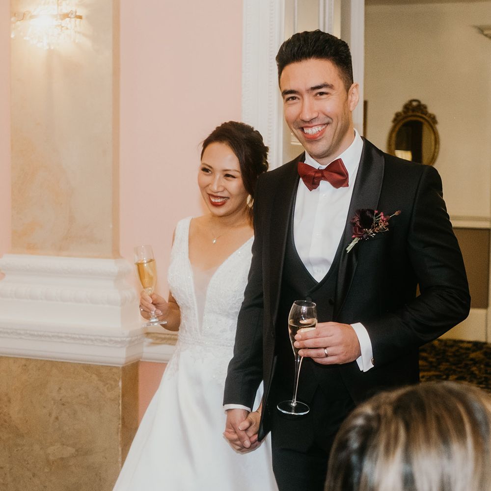Bride and groom make their entrance at Danesfield House