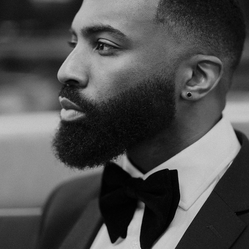 Beaded groom with a big bow tie 