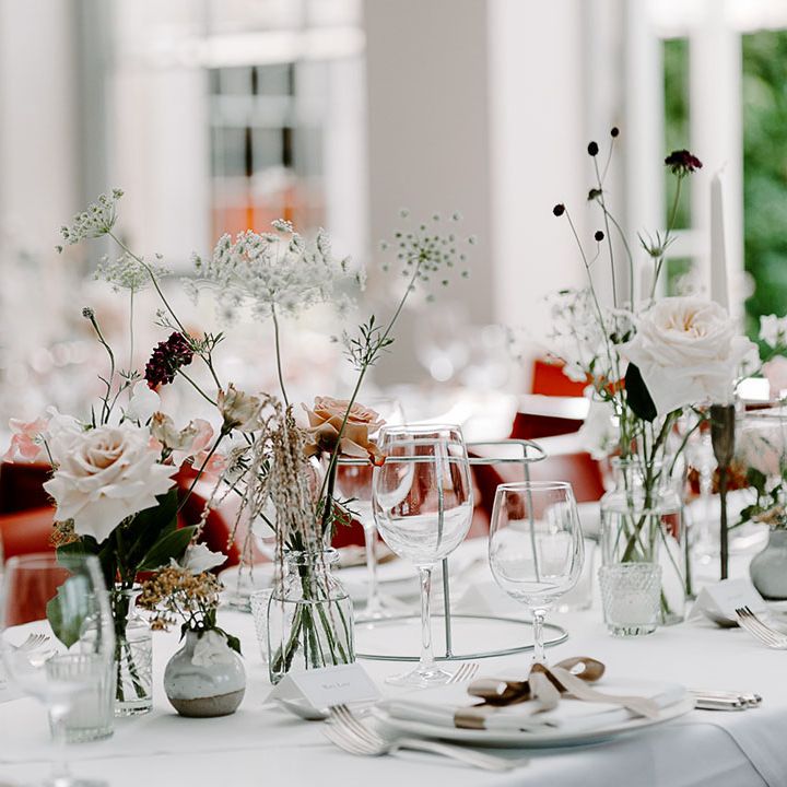 Bud vase wedding table decorations with soft neutral tones 