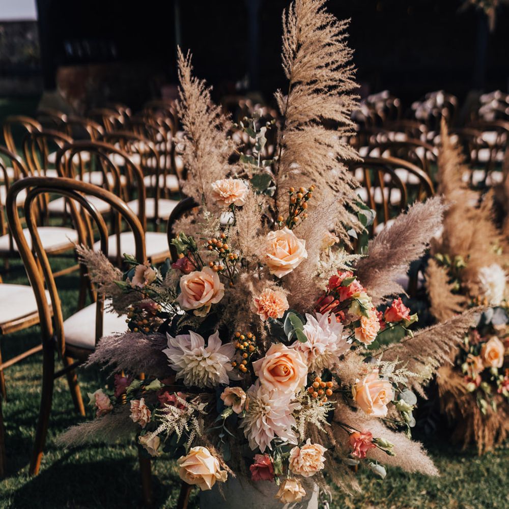 Milk churn flower arrangement with Pampas Grass