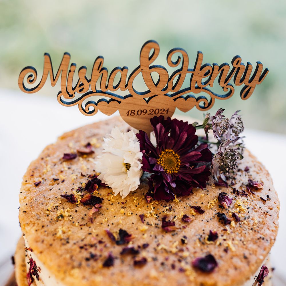 Wedding cake complete with dried florals and poppyseeds 