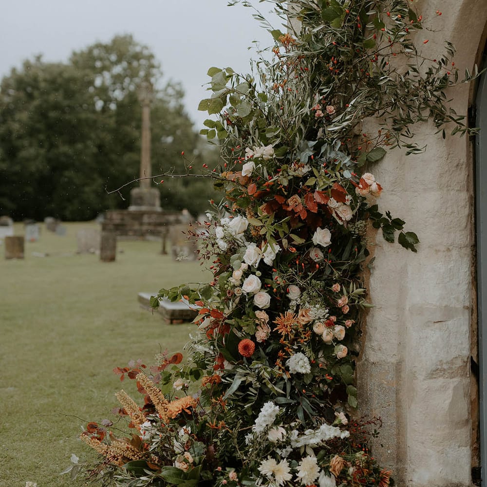 Amazing Autumnal flower decor at church wedding ceremony