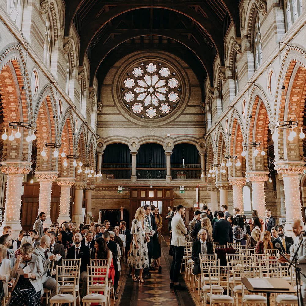  Wedding guests take their seats at church | Irene Yap Photography