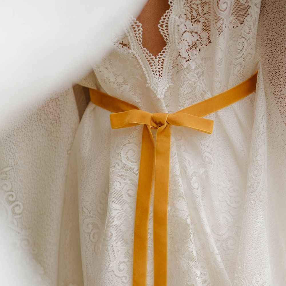 Yellow velvet ribbon tying the lace Kimono style wedding dress 