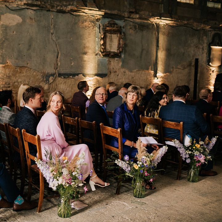 Wedding guests turn to get first look at the bride 
