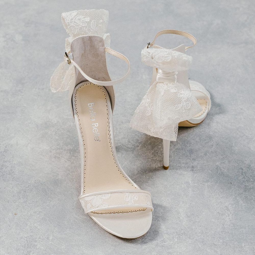 Lace wedding sandals with lace bow on the back of the heels from Heart & Soul Collection 