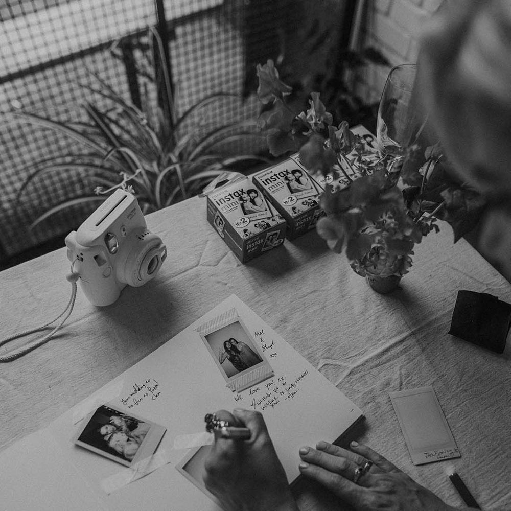 DIY wedding guestbook with Instax camera and polaroids at Hackney Studios