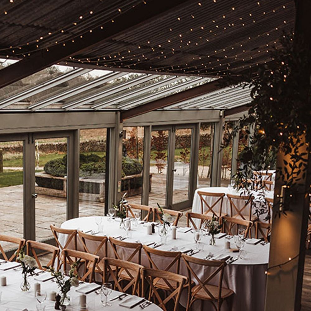 Stone Barn rustic winter wedding venue with neutral wedding tablescape and decorations 