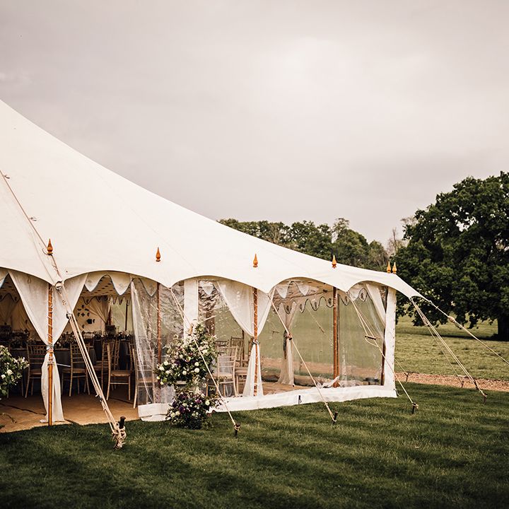 Marquee for wedding reception after traditional church wedding ceremony 