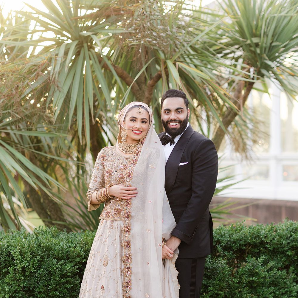 Bride & groom pose for couples portraits after Walima & Nikkah ceremony 