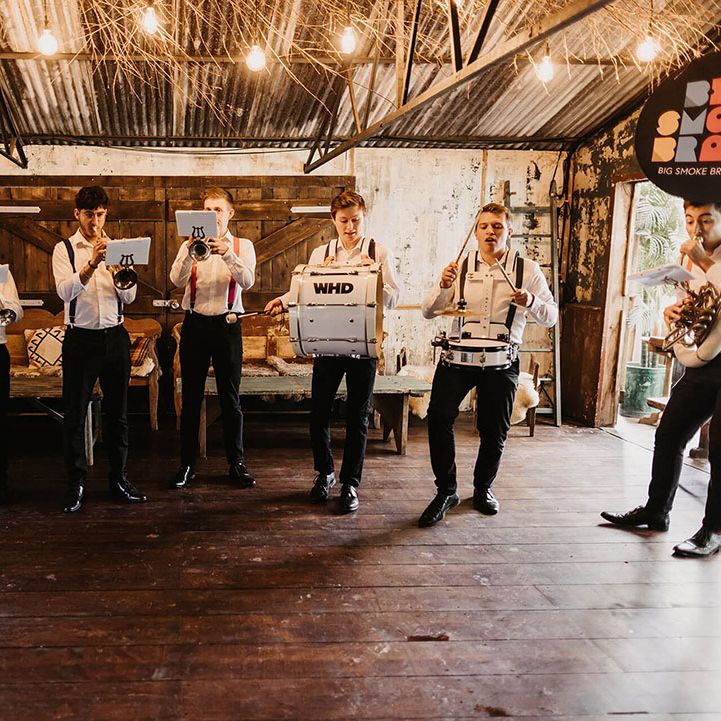 7 piece brass band plays at wedding ceremony
