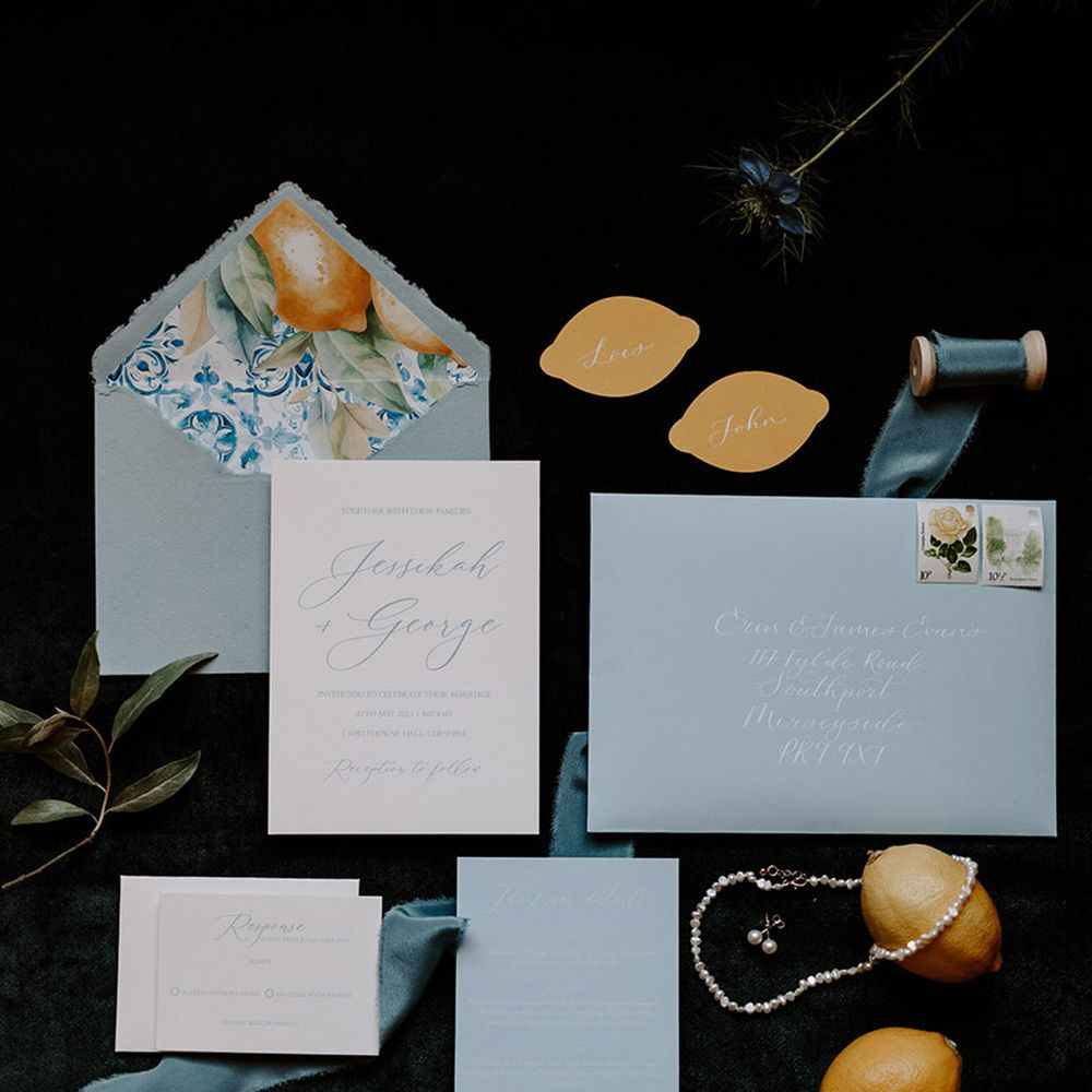 Classic pastel blue and white wedding stationery with lemons for contemporary outdoor wedding 